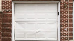 Dented Garage Door Repair and Replacement Services